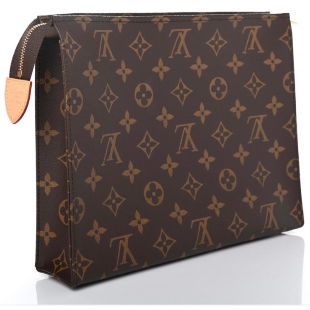 Louis Vuitton toiletry pouch 26. Barely used!